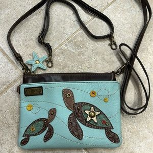 Chala Purse new without tags. Turtle design with star fish zipper pull.